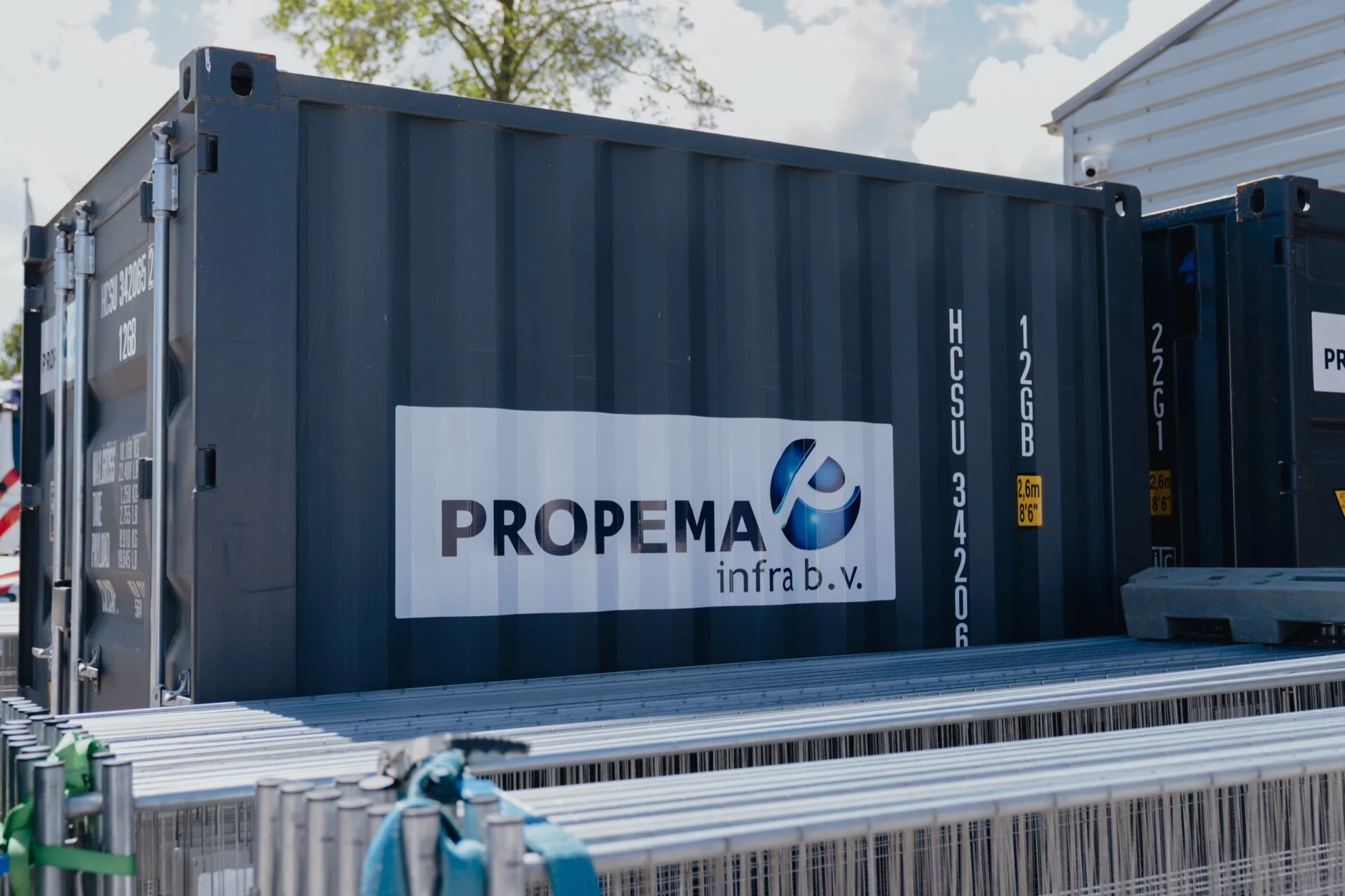 Containerbelettering Propema infra met logo